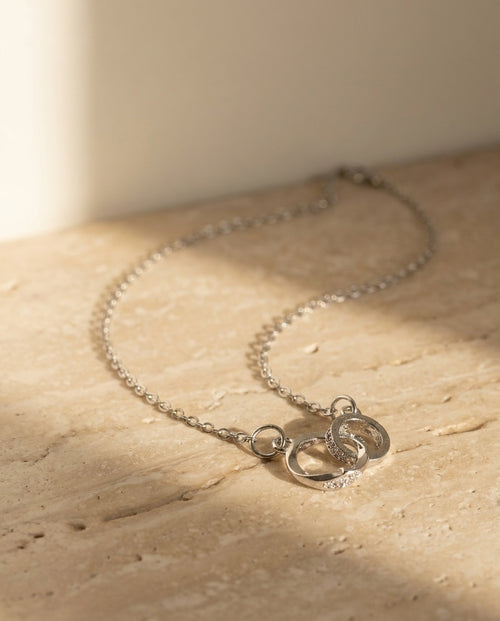 Armonia Necklace by ALTUNA on warm travertine