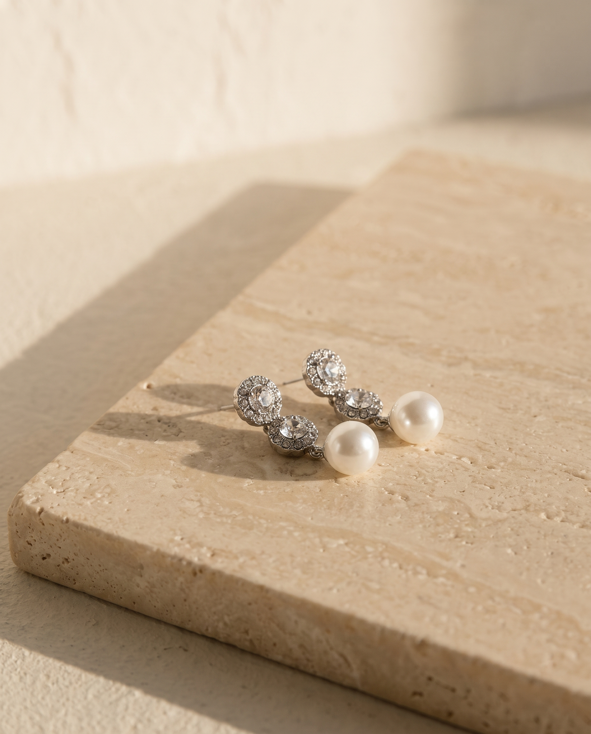 Aveline Pearl Drops on travertine